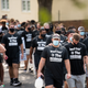 University of South Carolina quarterback Jay Urich puts a hand on the shoulder of offensive lineman Vincent Murphy while joining teammates and other student athletes on campus during a demonstration against racial inequality on August 31.